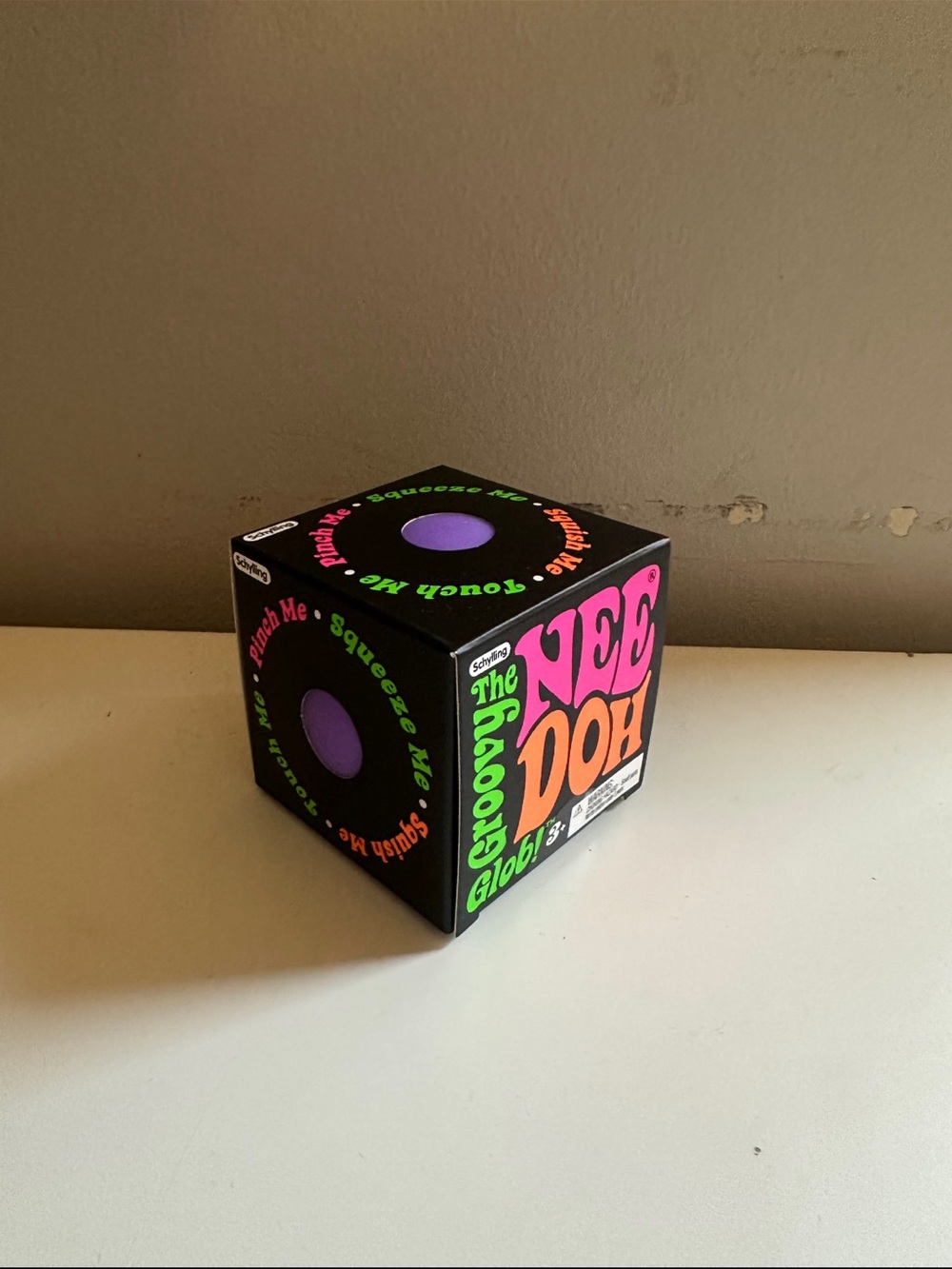 AUTHENTIC, BRAND NEW! 
The Groovy Glob - Black Box with Purple Toy
